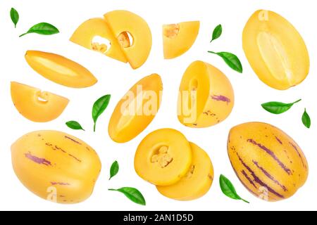 Fresh Pepino fruit with leaves isolated on white background. Top view, flat lay Stock Photo