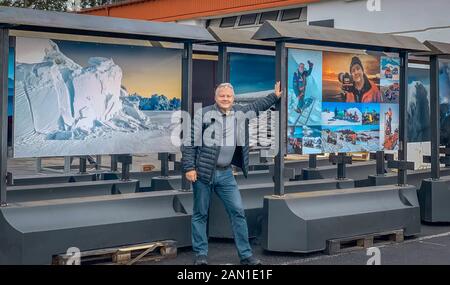 Ragnar Th Sigurdsson, Icelandic photographer in front of his images. The Jokulsarlon outdoor photo Exhibition, Iceland Stock Photo