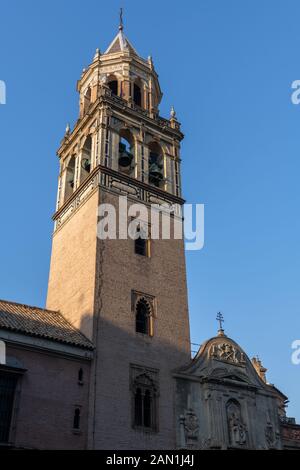 The bell tower of Iglesia de San Pedro, like the rest of the church, is a mix of Baroque and Mudejar styles. Velazquez was baptised in the church Stock Photo