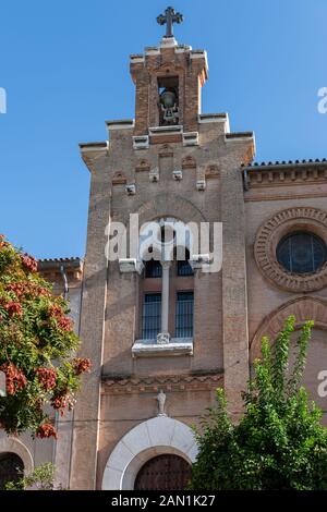 The tower and belfry of the Monasterio de la Visitacion de Santa Maria (Salesas Sevilla) in Plaza de las Mercedarias, Seville. Stock Photo