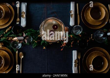 tea light candles in a candle holder on a decorated dinner table Stock Photo