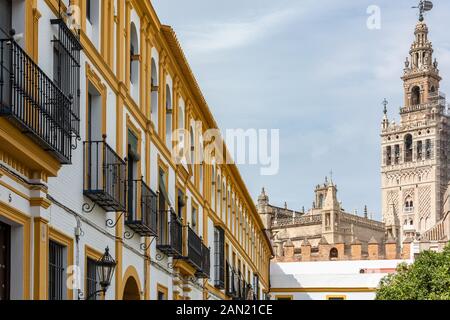 Seville's La Giralda bell tower from the Patio de Baneras in the Real Alcazar Stock Photo