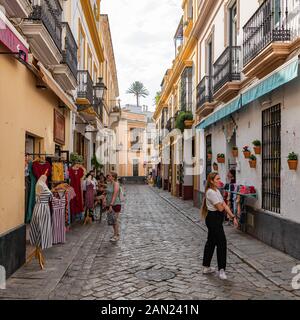 Colourful buildings line the narrow Pasaje de Andreu in Seville's old Jewish Quarter in Santa Cruz