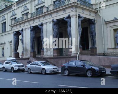 St. Petersburg, Russia, December 28, 2019, statue giants tall strong man Atlantes,  New Hermitage Stock Photo
