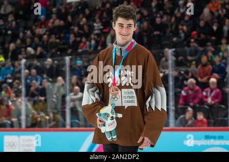 Lausanne, Switzerland. 15th Jan, 2020. Czech hockey player Matyas Sapovaliv receives the bronze medal after the ice hockey men's mixed NOC 3-on-3 competitions during the Lausanne 2020 Winter Youth Olympic Games in Lausanne, Switzerland, January 15, 2020. Credit: Vaclav Pancer/CTK Photo/Alamy Live News Stock Photo