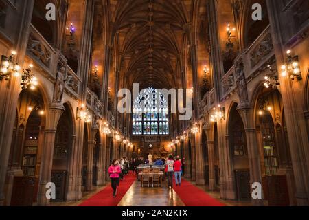 Manchester, UK: 20 October 2019: People visitig The John Rylands Library Historic Reading Room Stock Photo