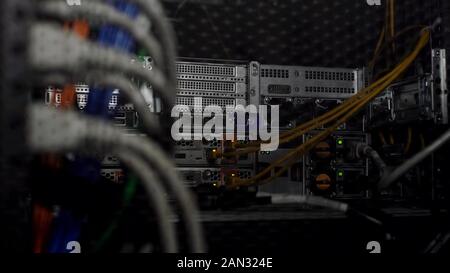 Database server hardware with networking cables, web hosting, cloud computing Stock Photo