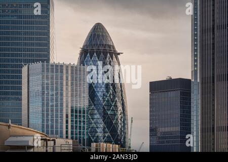 The Gherkin, 30 St Mary Axe, and other tall buildings in London Stock Photo