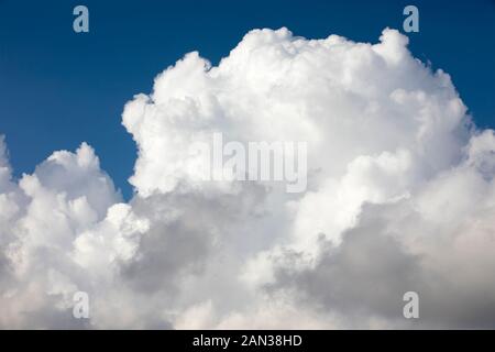 Cumulus cloud formation in deep blue sky over Mount Bental, Israel Stock Photo
