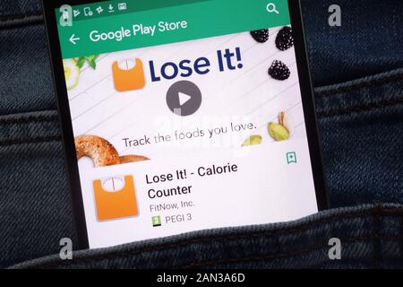 https://l450v.alamy.com/450v/2an3a6d/lose-it!-calorie-counter-app-on-google-play-store-website-displayed-on-smartphone-hidden-in-jeans-pocket-2an3a6d.jpg