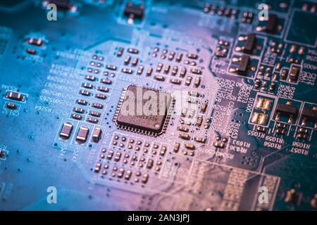 Circuit board. Electronic computer hardware technology. Motherboard digital chip. Tech science background. Integrated communication processor. SMD Stock Photo