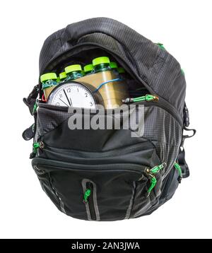 Time-bomb detail. Improvised explosive device in rucksack isolated on white background. Home-made timebomb inside of black baggage with open zipper. Stock Photo