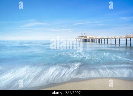 Modern steel pier or jetty, beach and sea. Lido Camaiore, Versilia, Tuscany, Italy, Europe Stock Photo