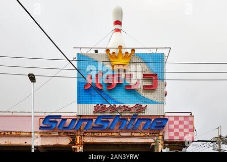 Pachinko Sunshine – old pachinko sign in Koza, Okinawa, Japan Stock Photo