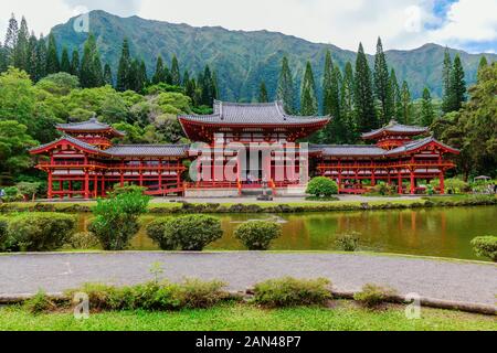 Oahu, Hawaii - November 04, 2019: Byodo-in Temple on Oahu with unidentified people. The temple was dedicated in August 1968 to commemorate the 100-yea Stock Photo