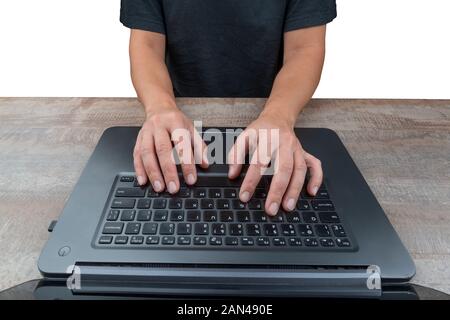 Hands on laptop keyboard. View from screen side. Online shopping, browsing or working concept. Focus on hands Stock Photo