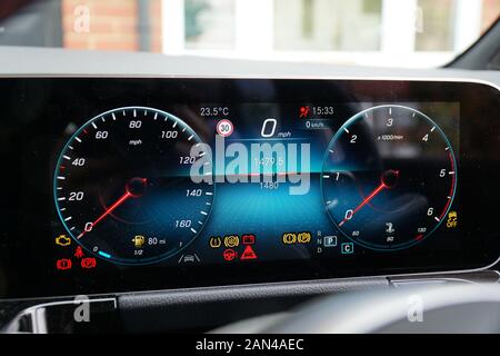 Warning lights on digital driver's display in the interior of a W247 Mercedes-Benz B-Class Stock Photo