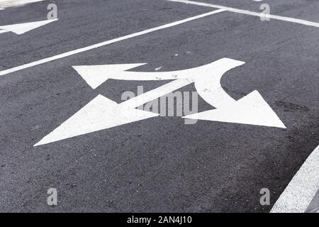 Straight or Turn Left or Right Road Sign on Asphalt. Stock Photo