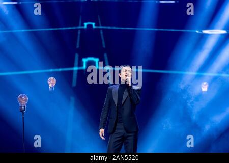 --FILE--Chinese actor Han Dongjun, also known as Elvis Han, sings at the stage of 2018 China TV Drama Awards in Beijing, China, 12 December 2018. *** Stock Photo