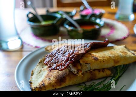 Mexican Traditional Food 'Tlayuda' in Oaxaca, Mexico Stock Photo