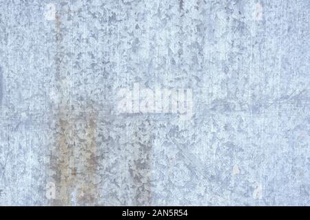 galvanized metal texture with old peeling paint. Metal background, copyspace. view from above. Stock Photo