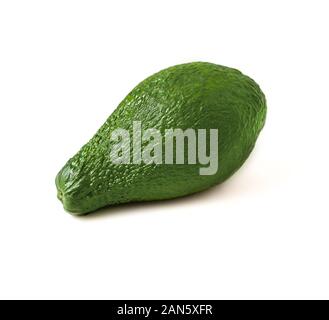 Avocado fruit on a white background. Isolated green shape with smooth edges. Stock Photo