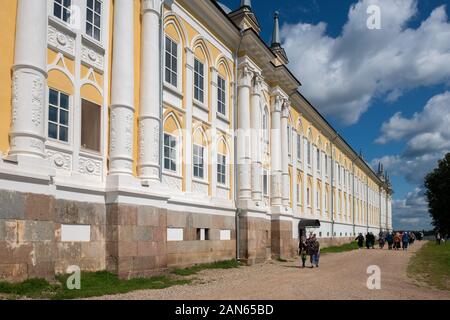 STOLOBNY iSLAND, RUSSIA - AUGUST 6, 2019: Pilgrims and tourists near the building of the monastery hotel. Nilo-Stolobenskaya Pustyn. Is situated on St Stock Photo