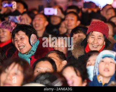 Shizhu, China's Chongqing Municipality. 14th Jan, 2020. Audience watch a benefit performance in Shizhu Tujia Autonomous County, southwest China's Chongqing Municipality, Jan. 14, 2020. Artists from China National Opera House staged a benefit performance for local people in Shizhu county. Credit: Wang Quanchao/Xinhua/Alamy Live News Stock Photo