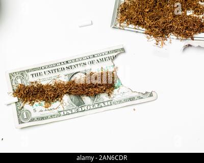snuff on one dollar bill, burnt money Stock Photo