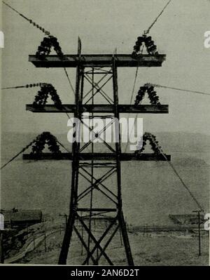 Pacific service magazine . Two 20,000 k. V. a. synchronous condensers installed atDixon substation Vaca-. South Tower, on the Contra Costa side of Carquinez straits, where the Vaca-Dixon Claremont 110,000-volt transmission line crosses San Francisco bay From Vaca-Dixon a certain portion ofthe power was fed into the P. G. & E. sys-tem in the Sacramento valley, but thegreater portion was of course required inthe bay region. It was decided that a vol-tage of 110,000 would be economically suit-able for transmission of the power fromVaca-Dixon to Claremont, which wasmarked as the distribution point Stock Photo