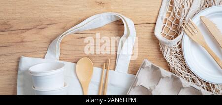 Eco-friendly Kitchen Utensils, Paper Disposable Tableware And Mesh Bag.  Wooden Cutlery And Shopping Bag On A Beige Background. Sustainable  Lifestyle. Zero Waste Concept Stock Photo, Picture and Royalty Free Image.  Image 188223475.