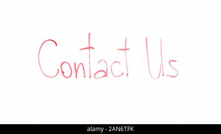 Contact us phrase written on glass, support service help to client, feedback Stock Photo