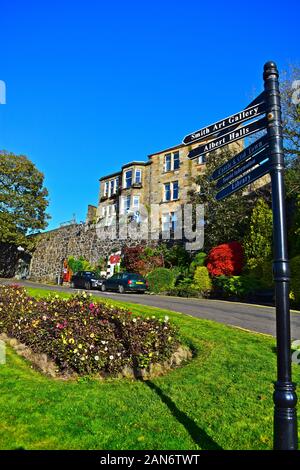 A street view of part of 'The Back Walk' road which leads up to the old town & castle. Part of old city walls in view. Stock Photo