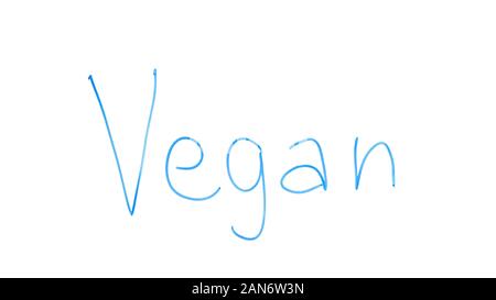 Vegan word written on glass, way of life, abstaining from use of animal products Stock Photo