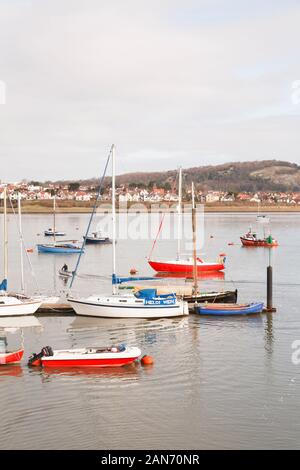 CONWY, UK - February 26, 2012. Yachts, sailing boats, moored in a harbour on Welsh coast at Conwy, North Wales Stock Photo