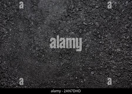 Texture made from a small pieces of coal, close-up shot. Stock Photo