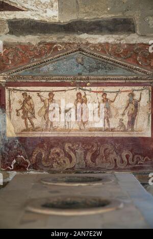 Pompei. Italy. Archaeological site of Pompeii. House and Thermopolium of Vetutius Placidus on via dell’Abbondanza (Casa e Thermopolium di Vetutius Pla Stock Photo