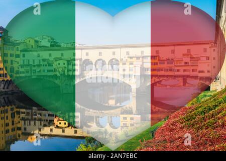 Ponte Vecchio, old bridge, in Florence, Tuscany, Italy with an Italian heart-shaped flag composed on sunny autumn day Stock Photo