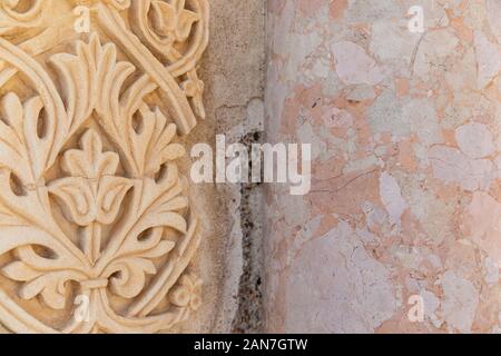 Cordoba, Spain -  November 1 2019: Fragment of wall with floral paterns in 10th century ruined Moorish medieval city Medina Azahara in Andalucia on No Stock Photo