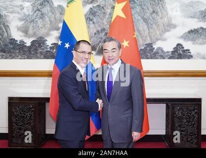 (200116) -- BEIJING, Jan. 16, 2020 (Xinhua) -- Chinese State Councilor and Foreign Minister Wang Yi holds talks with visiting Venezuelan Foreign Minister Jorge Arreaza in Beijing, capital of China, Jan. 16, 2020. (Xinhua/Li Xiang) Stock Photo