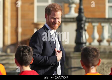 The Duke of Sussex meets children in the Buckingham Palace gardens, London, as he hosts the Rugby League World Cup 2021 draws. Stock Photo