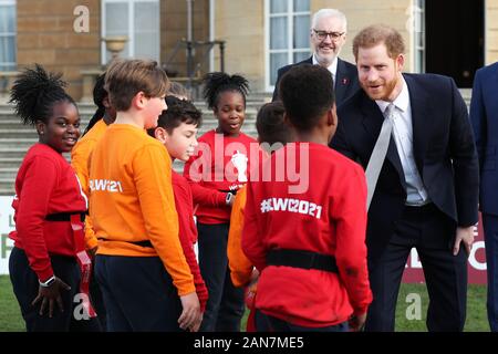 The Duke of Sussex meets children in the Buckingham Palace gardens, London, as he hosts the Rugby League World Cup 2021 draws. Stock Photo