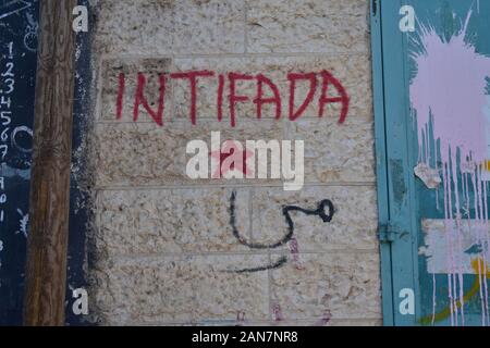 Intifada graffiti in Aida Refugee Camp in Bethlehem West Bank Stock Photo