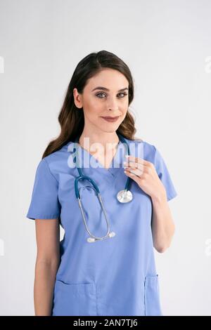 Portrait of smiling nurse with stethoscope Stock Photo