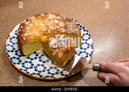 Orange and almond cake slice.Home baking. Stock Photo