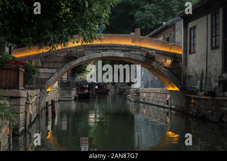 Old stone bridge over the canal in chinese village, Suzhou Stock Photo