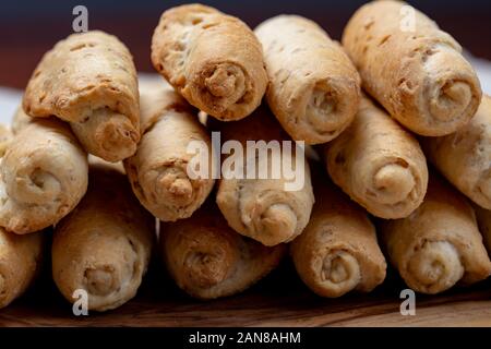 Small italian bread rolls crostini made from wheat dough with sesame close up Stock Photo