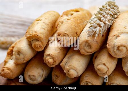 Small italian bread rolls crostini made from wheat dough with sesame close up Stock Photo