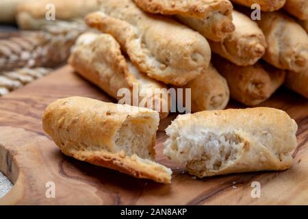 Small italian bread rolls crostini made from wheat dough with sesame close up Stock Photo