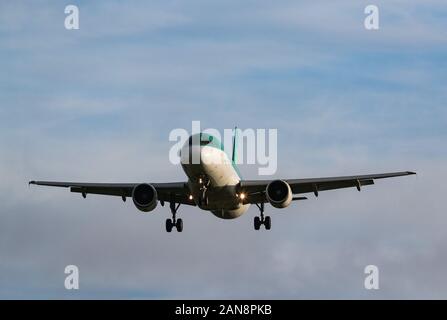 Cork Airport, Ireland - 13th January: Aer Lingus passenger jet coming in for landing at Cork Airport, Republic of Ireland Stock Photo